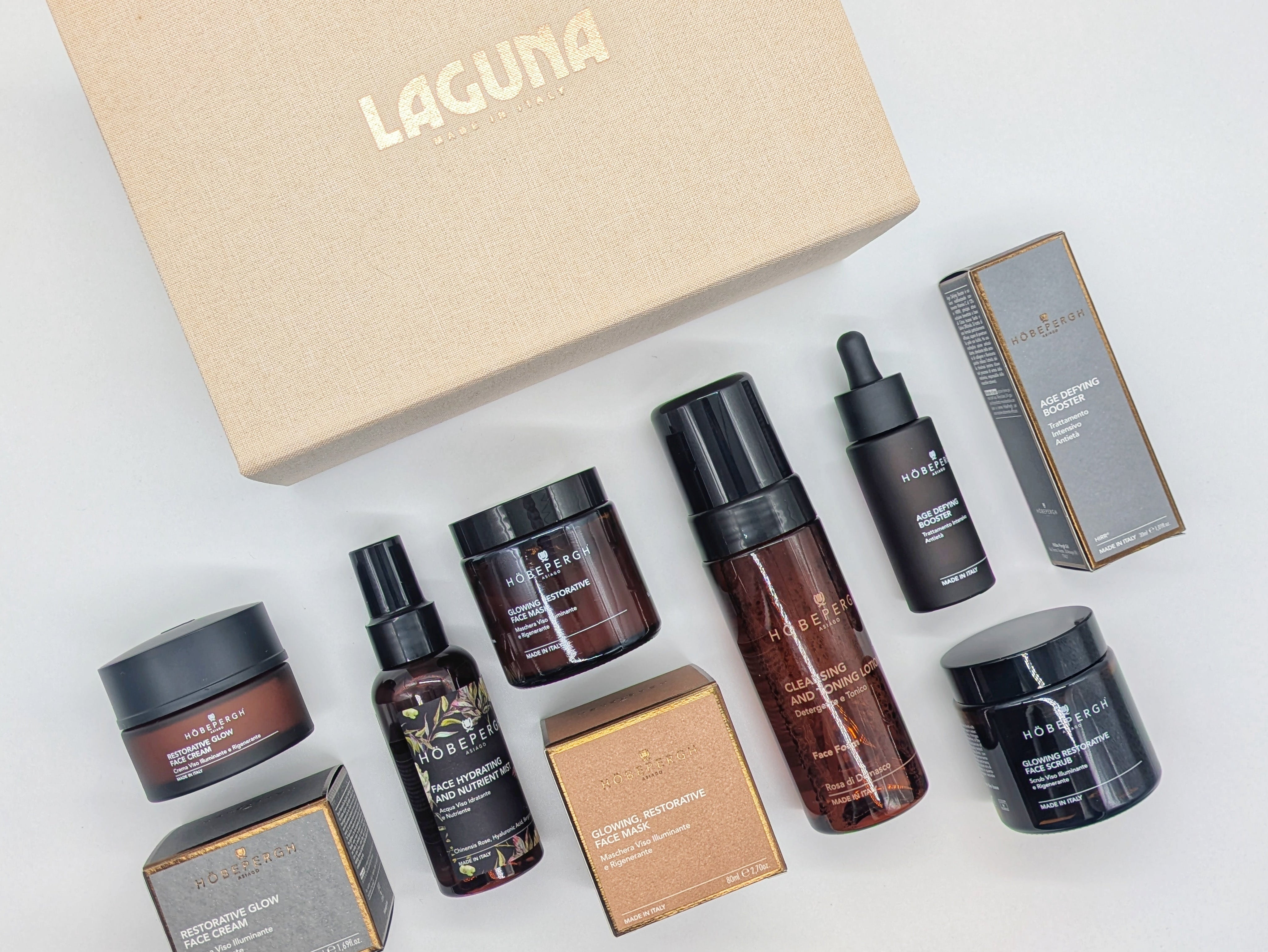 Collection of skincare products with Laguna box on a light gray background